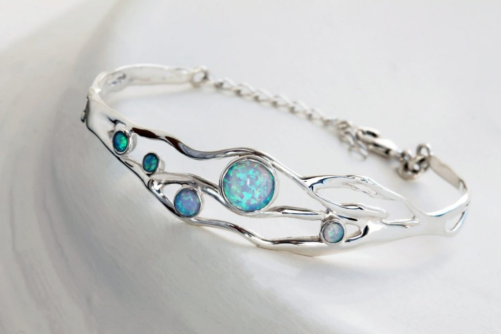 gw bng 001 wave bangle blue opals main