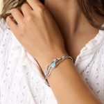 gw bng 001 wave bangle blue opals model neckline