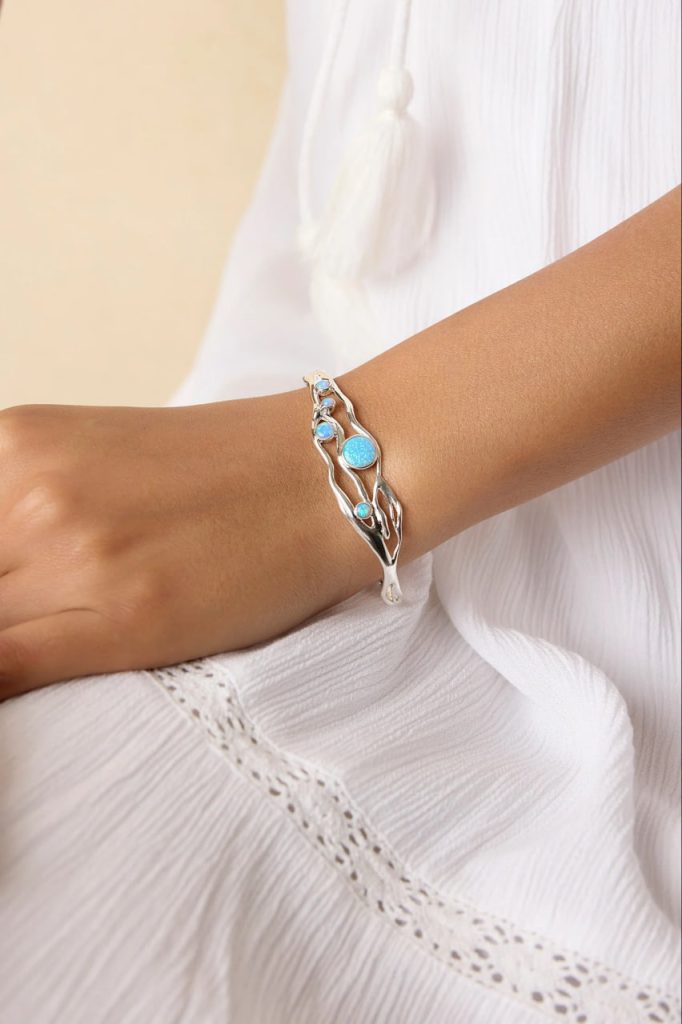 gw bng 001 wave bangle blue opals model wrist 1