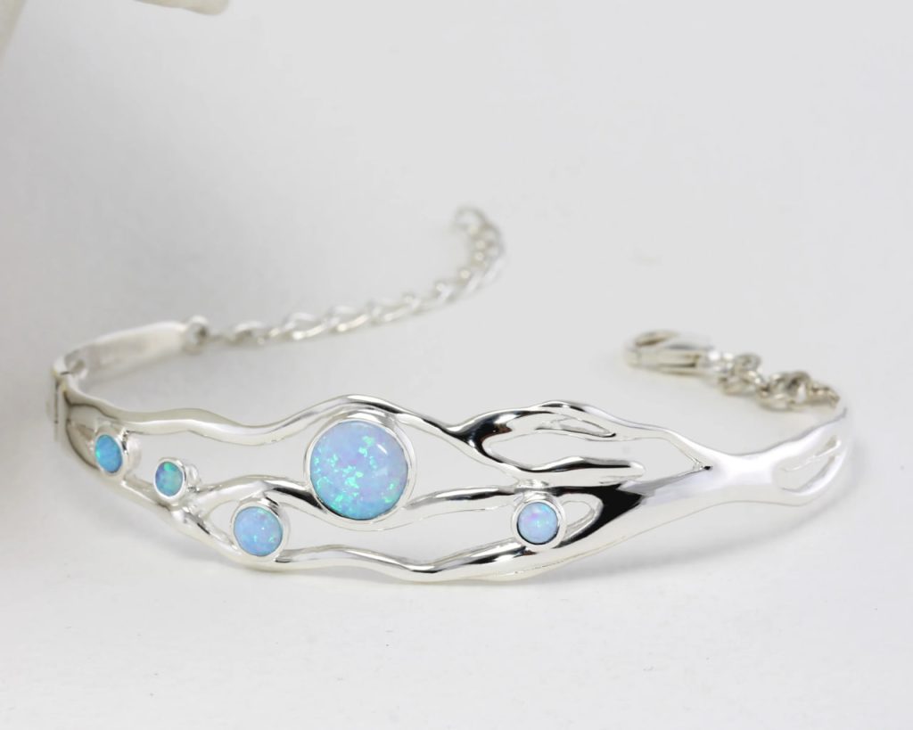 gw bng 001 wave bangle blue opals styled white flat