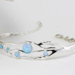 gw bng 001 wave bangle blue opals styled white flat