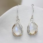 gw ear 002 teardrop earrings rainbow moonstone styled cushion 1