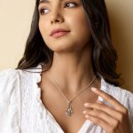 gw pnd 002 sculptural pendant blue topaz pearl model portrait