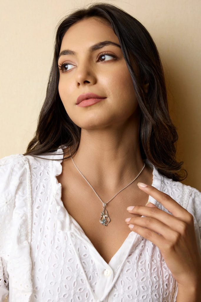 gw pnd 002 sculptural pendant blue topaz pearl model portrait
