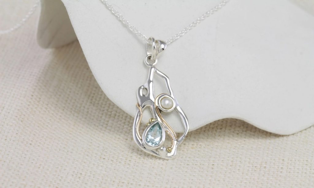 gw pnd 002 sculptural pendant blue topaz pearl styled fabric