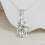gw pnd 002 sculptural pendant blue topaz pearl styled fabric