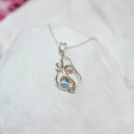 gw pnd 002 sculptural pendant blue topaz pearl styled stone