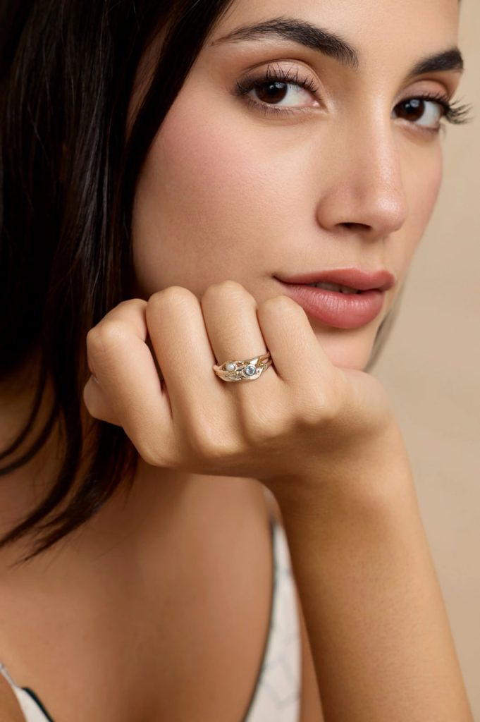 gw rng 001 sculptural statement ring pearl blue topaz model hand